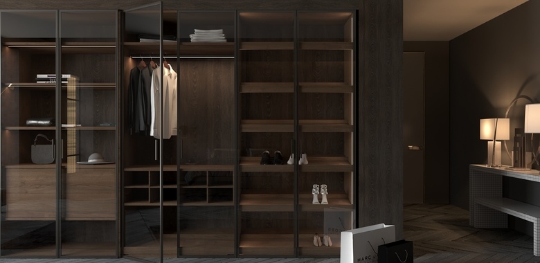 BauCloset Trend system with long glass doors, interior lighting and shoe shelves