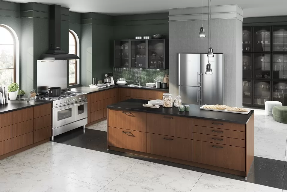 cocina de transición con estufa de 48" y refrigerador, pintura de pared verde, gabinetes de cocina de madera marrón
